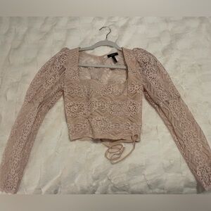 Forever 21 long sleeve top worn once, corset in the back, subtly puffed sleeves